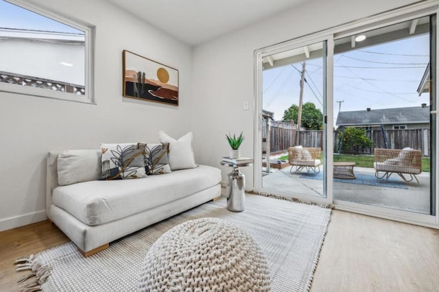 living area with light hardwood / wood-style floors