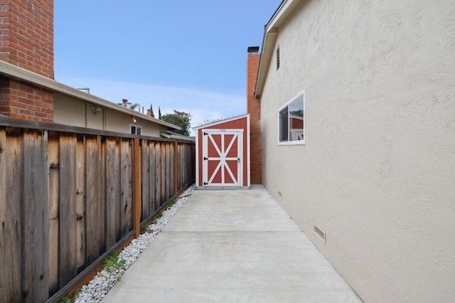 exterior space featuring a storage shed