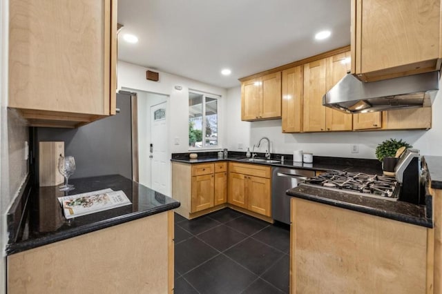 kitchen featuring light brown cabinetry, ventilation hood, sink, dark tile patterned flooring, and stainless steel dishwasher