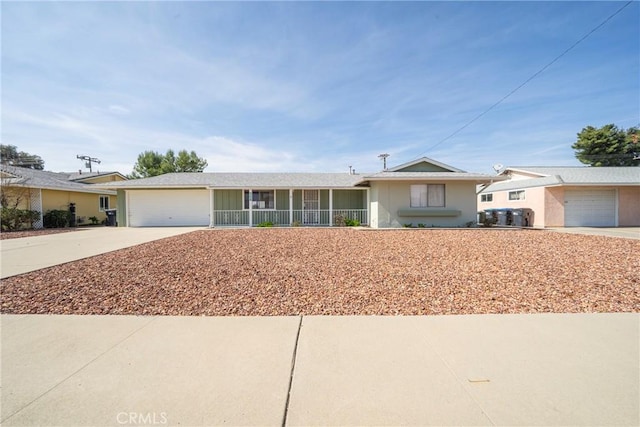 ranch-style home featuring a garage