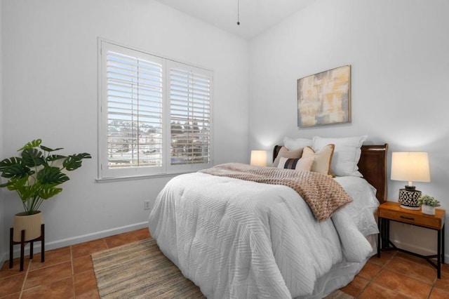 bedroom featuring tile patterned flooring