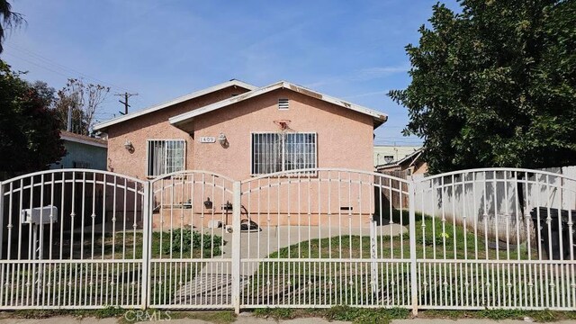 view of gate featuring fence