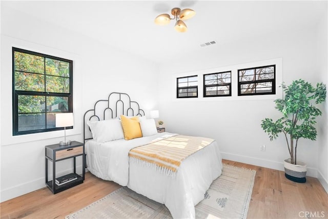 bedroom featuring light hardwood / wood-style flooring