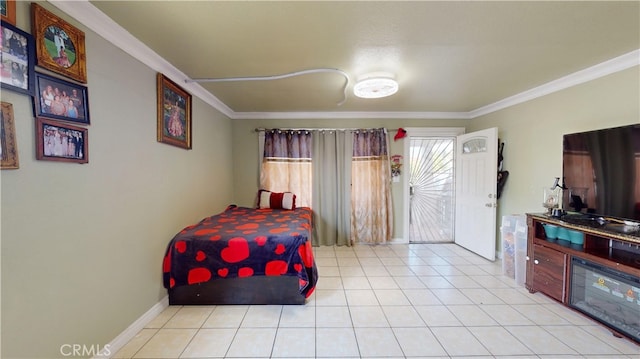 bedroom with light tile patterned floors and ornamental molding