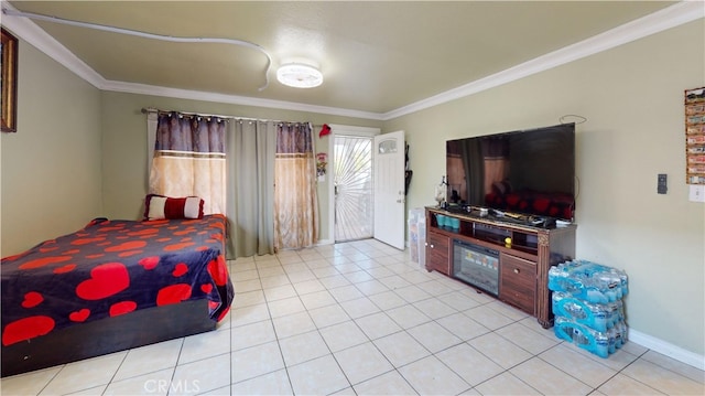 bedroom with light tile patterned floors and crown molding