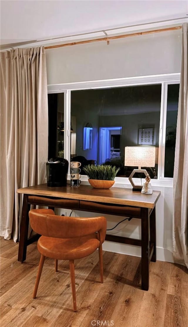 dining room featuring hardwood / wood-style flooring