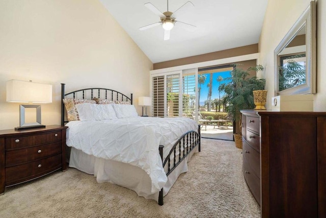 carpeted bedroom featuring access to exterior, vaulted ceiling, and ceiling fan