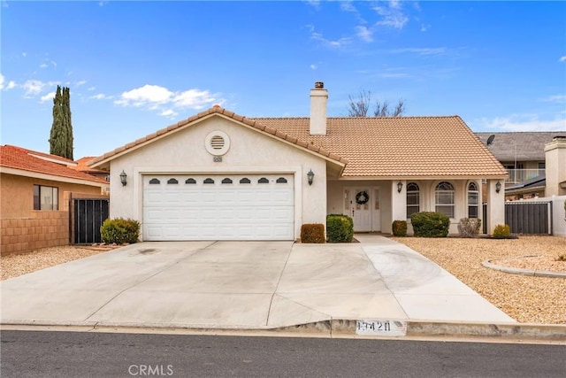 ranch-style home with a garage