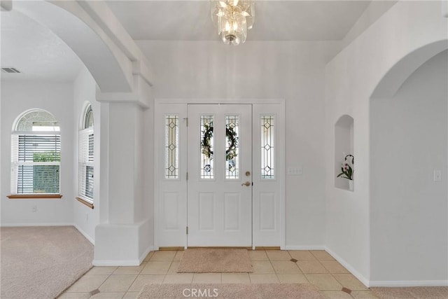 entrance foyer featuring light tile patterned floors