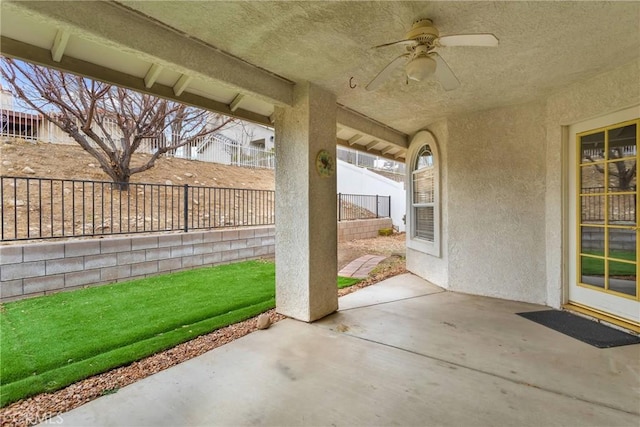 view of patio / terrace featuring ceiling fan