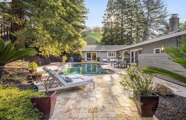 view of pool with a patio area