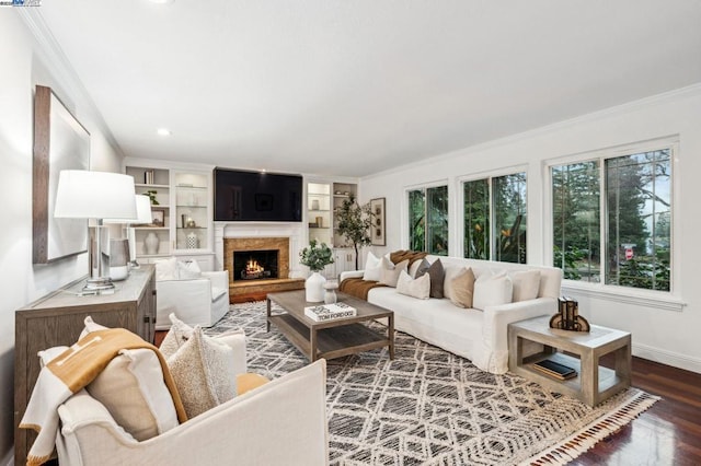 living room with crown molding and dark wood-type flooring