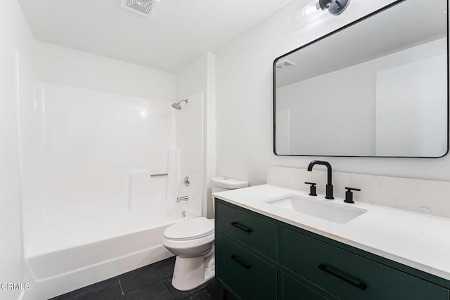 full bathroom featuring vanity, toilet, bathing tub / shower combination, and tile patterned flooring