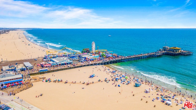 aerial view with a water view and a view of the beach