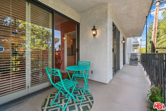 view of patio / terrace featuring a balcony