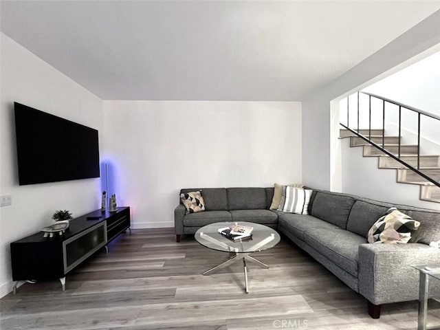 1137 Tiffany Cir S, Palm Springs, CA 92262 - living room featuring wood finished floors, stairs, and baseboards