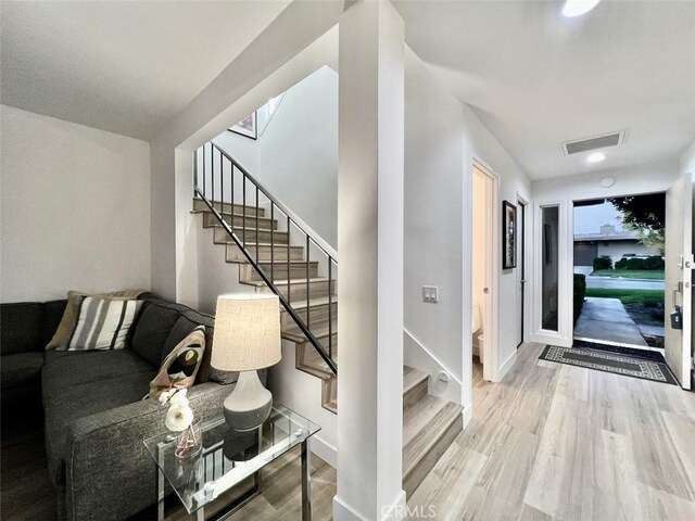 1137 Tiffany Cir S, Palm Springs, CA 92262 - stairway featuring wood finished floors and baseboards