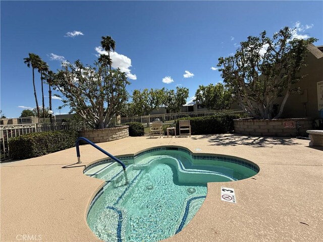 1137 Tiffany Cir S, Palm Springs, CA 92262 - view of pool with a patio area, a fenced backyard, and a pool