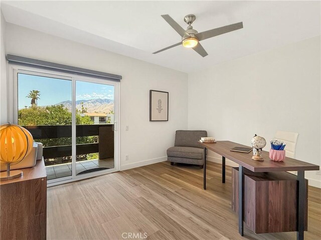 1137 Tiffany Cir S, Palm Springs, CA 92262 - sitting room with wood finished floors and a ceiling fan