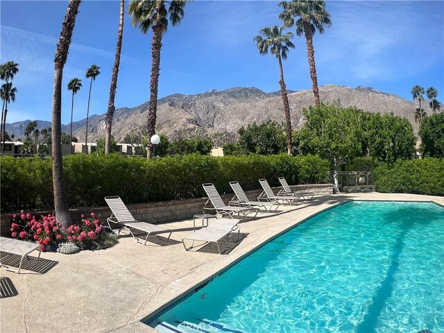 1137 Tiffany Cir S, Palm Springs, CA 92262 - outdoor pool with a patio and a mountain view