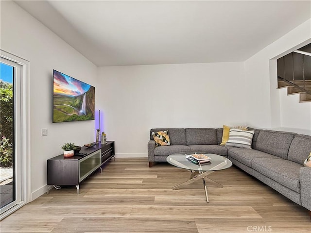 1137 Tiffany Cir S, Palm Springs, CA 92262 - living room featuring light wood-style flooring and baseboards