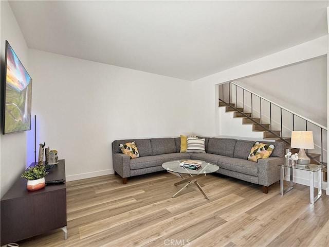 1137 Tiffany Cir S, Palm Springs, CA 92262 - living room featuring light wood-style floors and stairway
