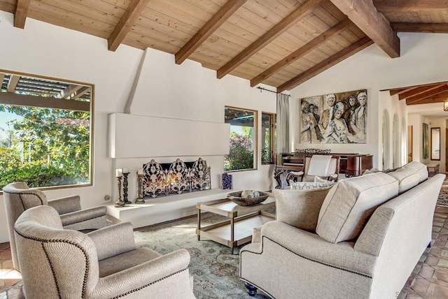 living room featuring lofted ceiling with beams and wooden ceiling