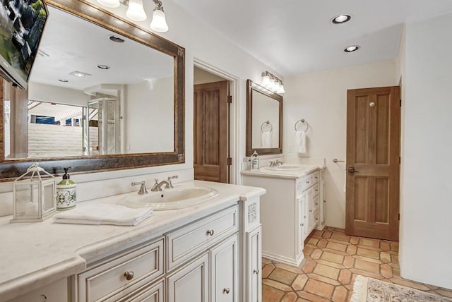 bathroom with vanity, tile patterned floors, and walk in shower