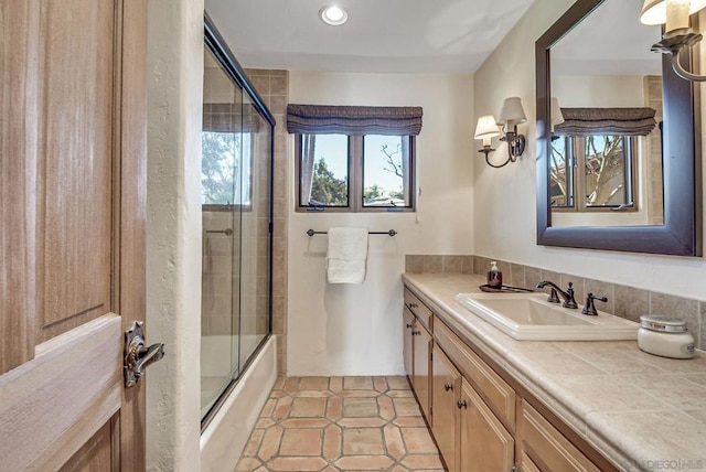 bathroom featuring tile patterned flooring and vanity