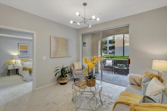 carpeted living room with a notable chandelier