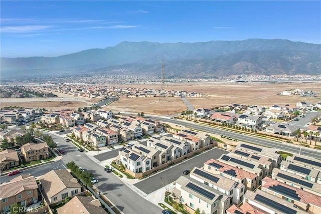 drone / aerial view featuring a mountain view