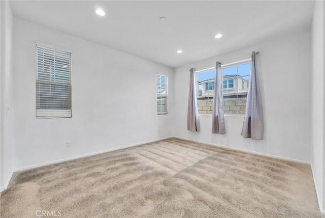 view of carpeted spare room