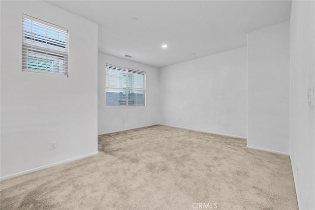 view of carpeted spare room