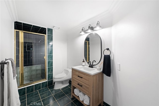 bathroom with walk in shower, vanity, crown molding, and tile patterned flooring