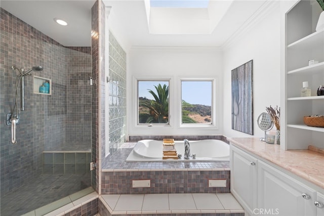 bathroom with plus walk in shower, ornamental molding, and vanity