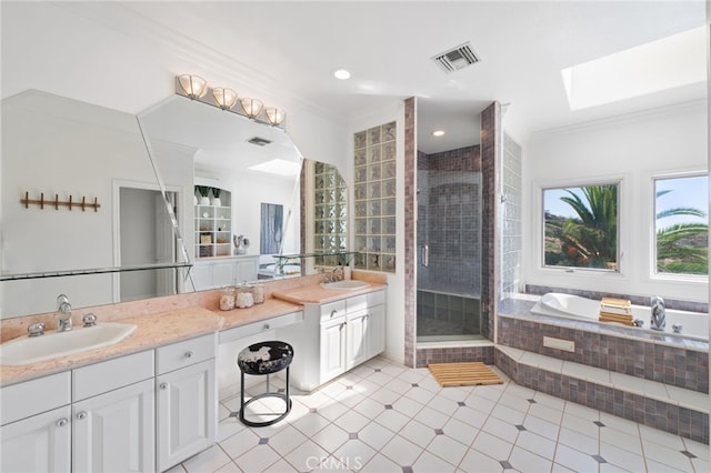 bathroom with crown molding, vanity, plus walk in shower, and a skylight