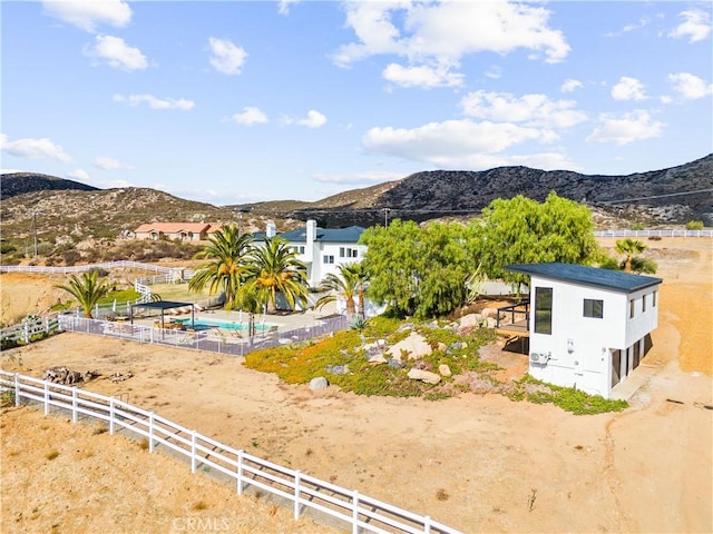 property view of mountains featuring a rural view