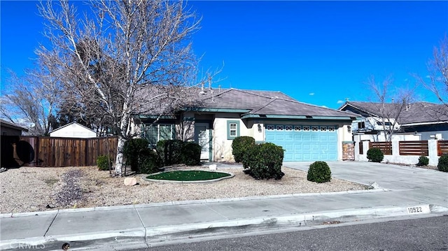 single story home with a garage