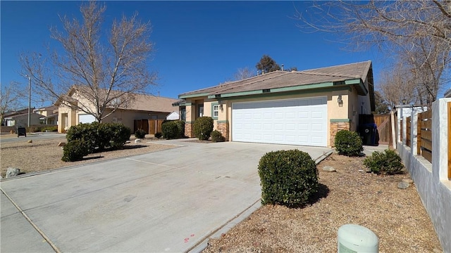 ranch-style home featuring a garage