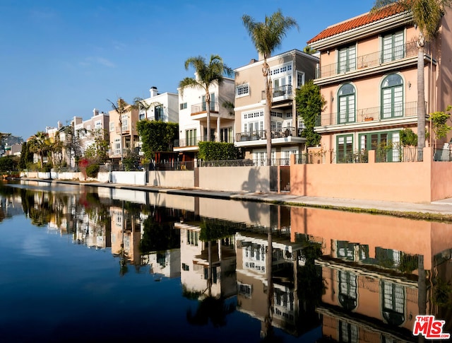 view of building exterior featuring a water view