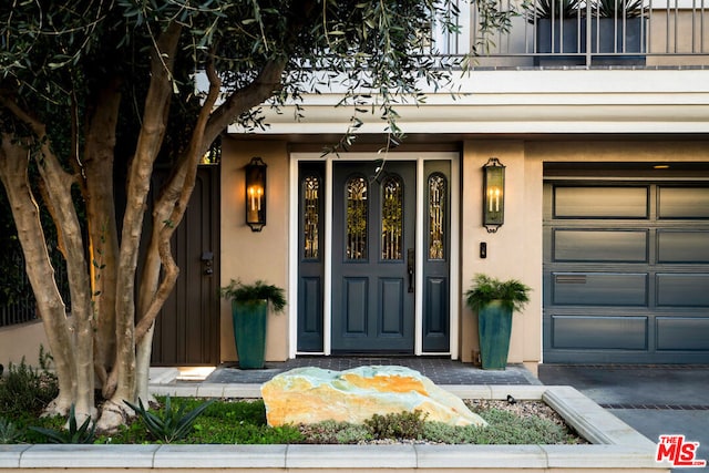 doorway to property featuring a balcony