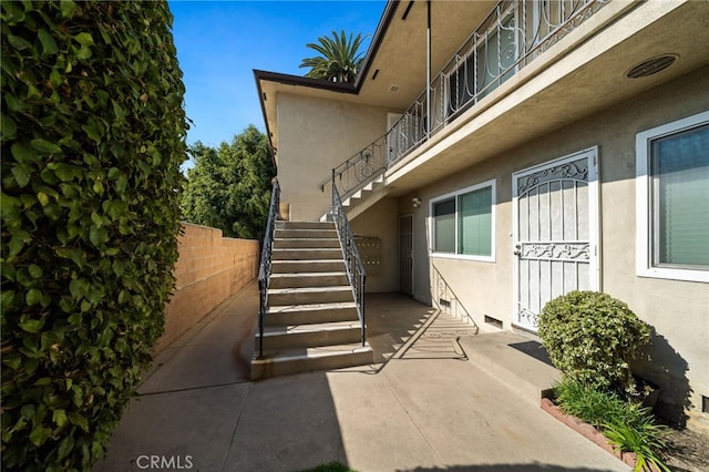 734 Linden Ave Unit 7, Long Beach, CA 90813 - doorway to property featuring stucco siding and a patio area