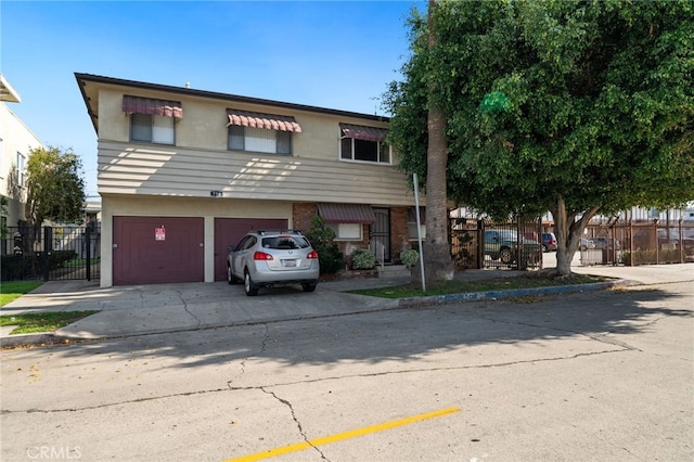 view of front of property featuring a garage