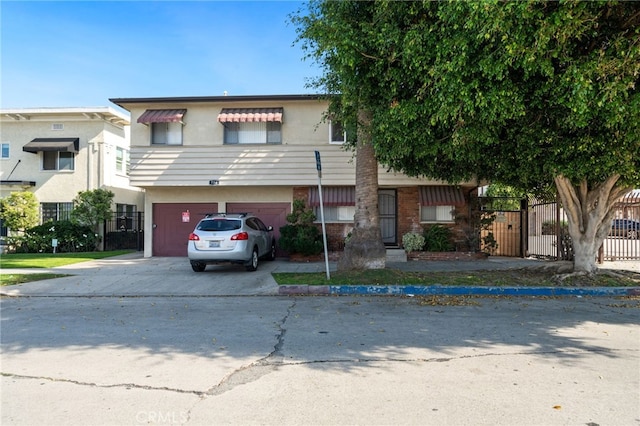 view of front of property featuring a garage