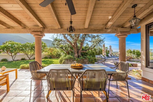 view of patio with ceiling fan