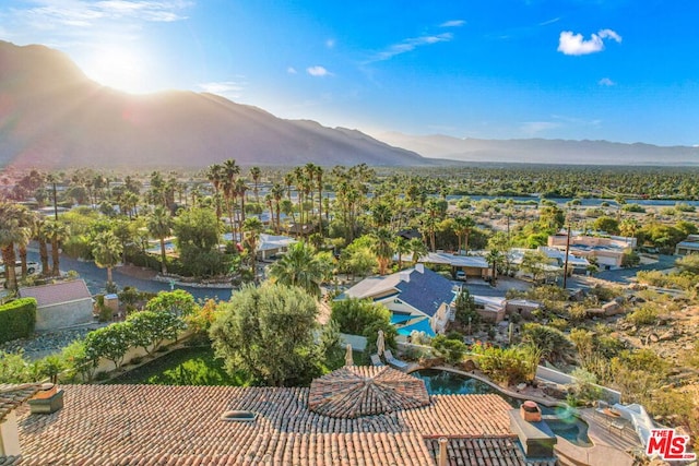 bird's eye view with a mountain view