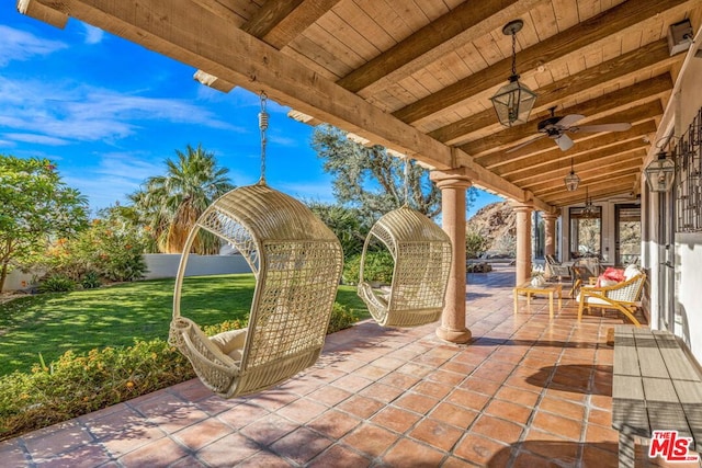 view of patio with ceiling fan