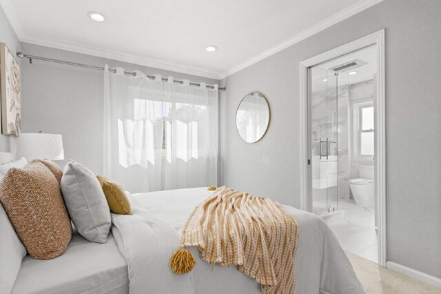 bedroom with ensuite bath and ornamental molding