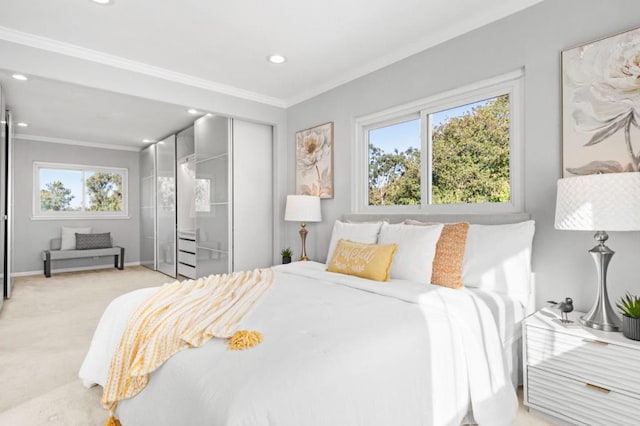 carpeted bedroom featuring ornamental molding