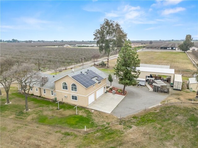 birds eye view of property featuring a rural view